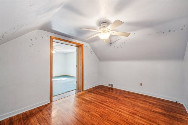 bonus room featuring ceiling fan, hardwood / wood-style flooring, and lofted ceiling