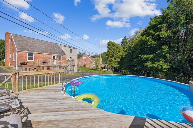 view of pool with a deck