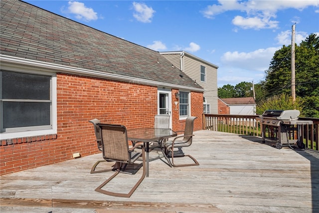 deck featuring a grill