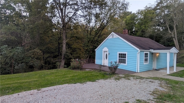 view of home's exterior featuring a lawn