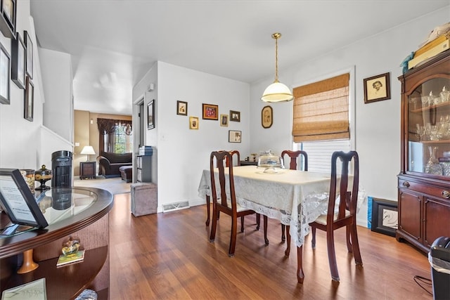 dining area featuring hardwood / wood-style flooring