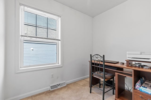 view of carpeted office space