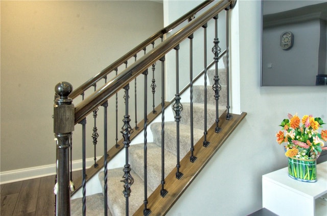 stairway with wood-type flooring