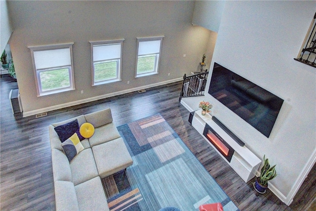 living room with dark wood-type flooring