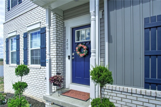 property entrance featuring covered porch