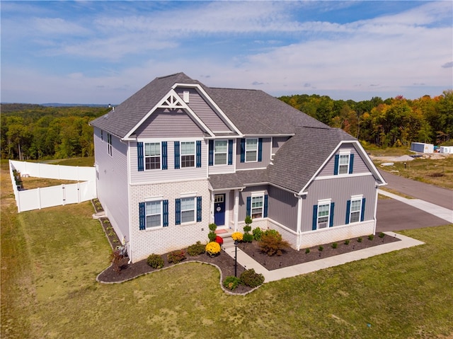 view of front of home featuring a front yard