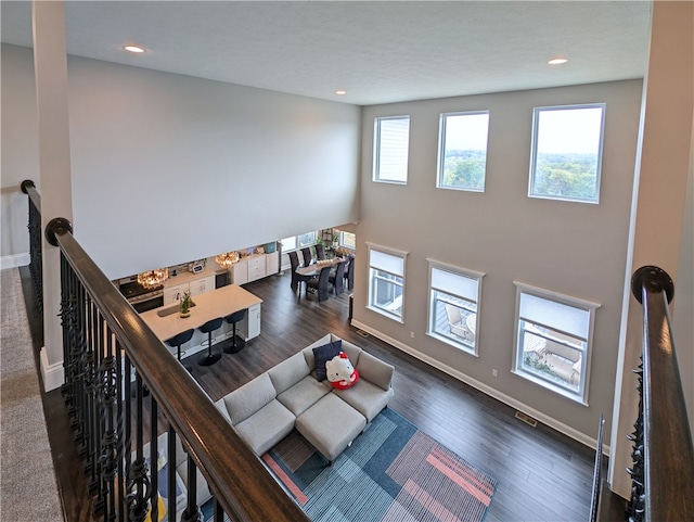 living room with dark wood-type flooring