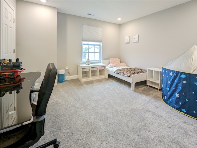 bedroom featuring carpet