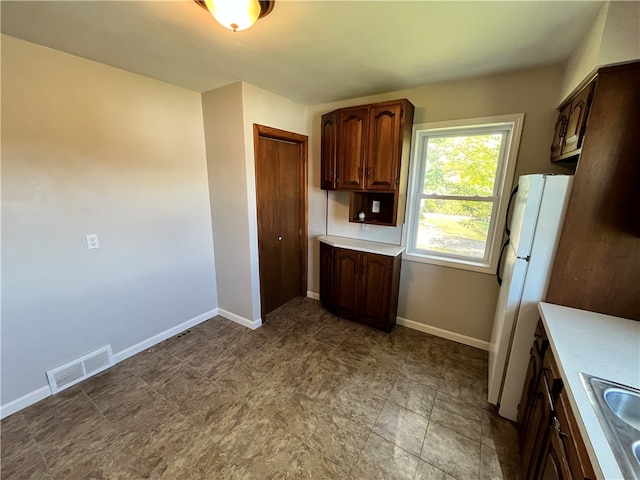 kitchen with white refrigerator