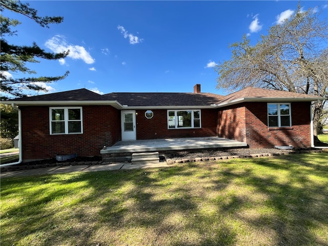 single story home featuring a front yard