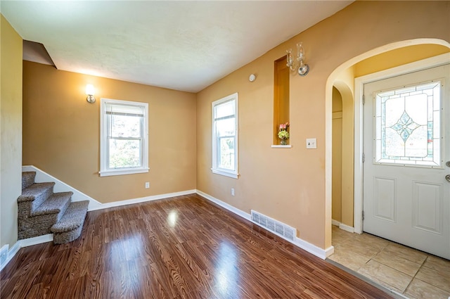 foyer entrance featuring hardwood / wood-style flooring