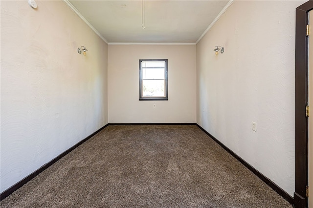 carpeted spare room featuring ornamental molding