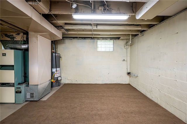 basement with heating unit and gas water heater