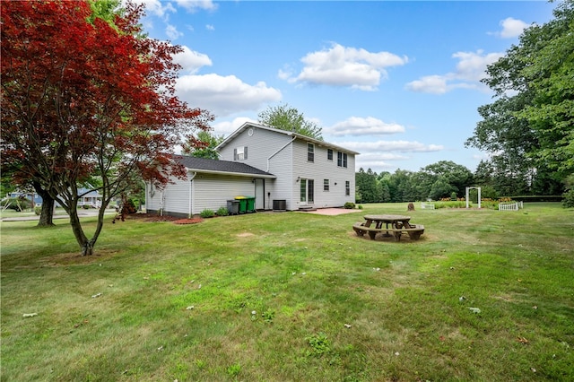 view of yard with a patio area and central AC