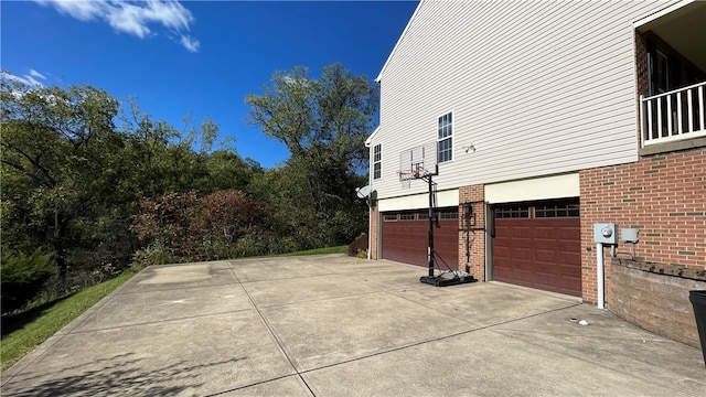 view of side of property featuring a garage