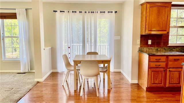 dining room featuring light hardwood / wood-style floors