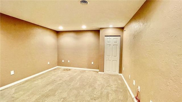 unfurnished room featuring carpet flooring