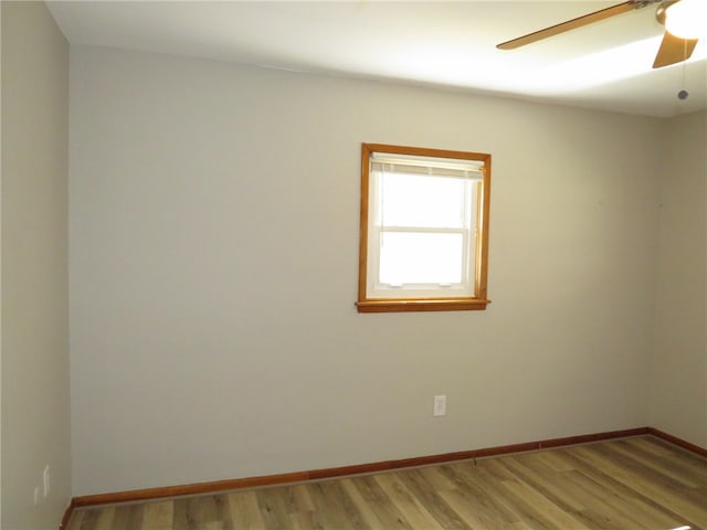 unfurnished room with ceiling fan and light hardwood / wood-style flooring