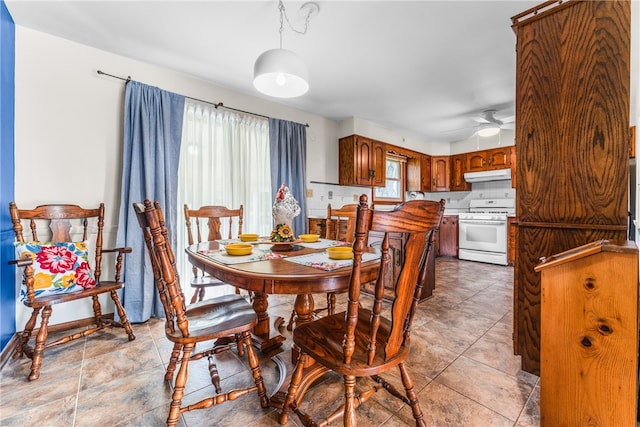 dining area featuring ceiling fan