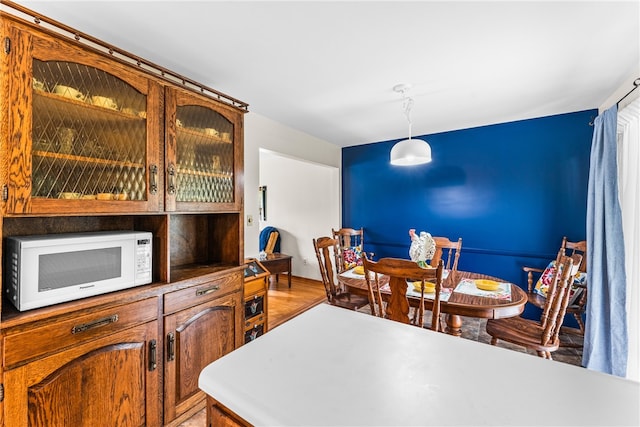 dining area with light hardwood / wood-style flooring