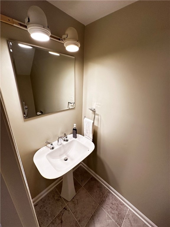 bathroom with tile patterned flooring