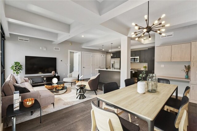 dining room with a notable chandelier, beam ceiling, and dark wood-type flooring