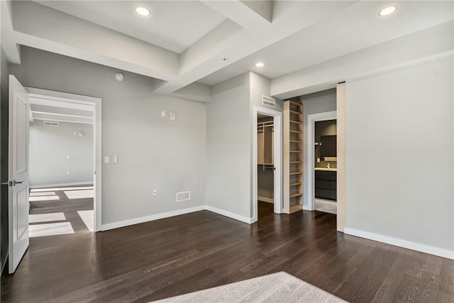 empty room with dark hardwood / wood-style flooring