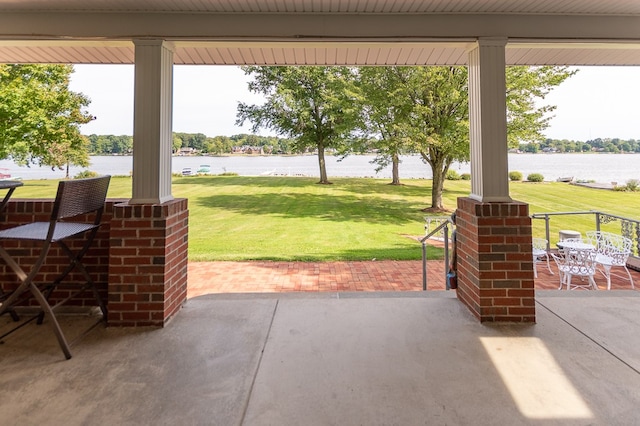 view of patio / terrace featuring a water view