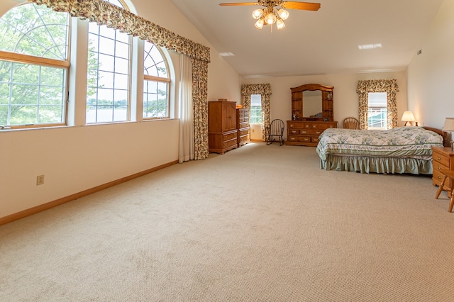 bedroom with carpet, multiple windows, and ceiling fan