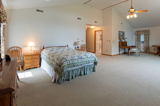 bedroom with multiple windows, light carpet, high vaulted ceiling, and ceiling fan