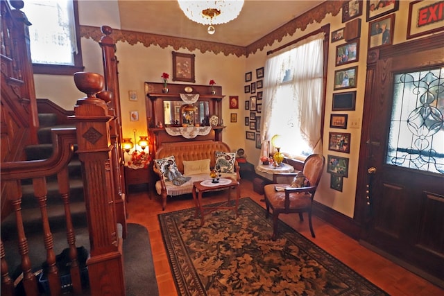 entrance foyer featuring plenty of natural light and a chandelier