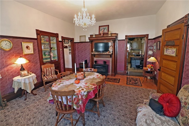 dining space with a chandelier