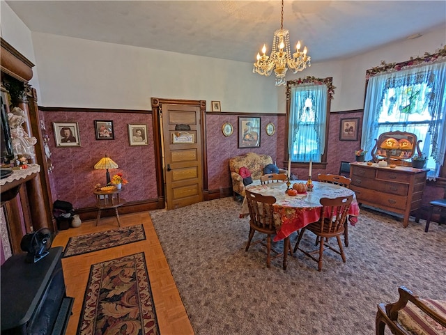 dining room with a notable chandelier