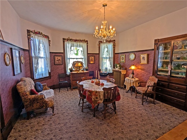 dining space featuring a chandelier