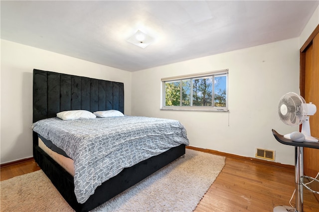 bedroom featuring hardwood / wood-style flooring