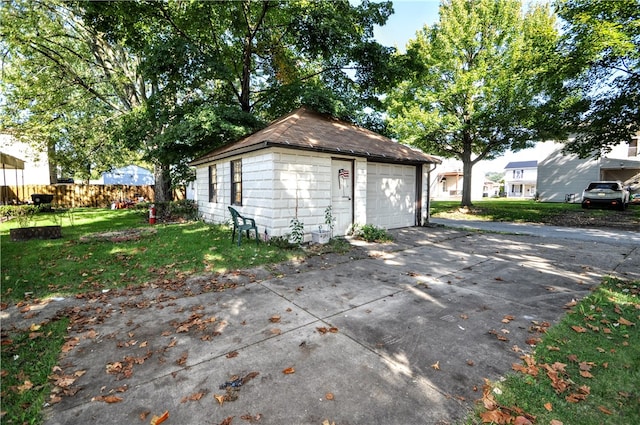 garage with a yard