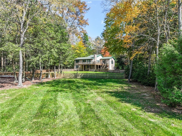 view of yard with a deck