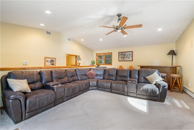 carpeted living room with ceiling fan and lofted ceiling