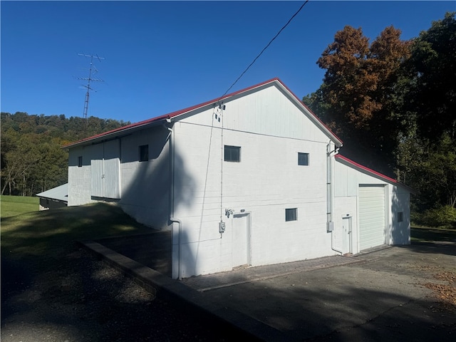 view of home's exterior with a garage