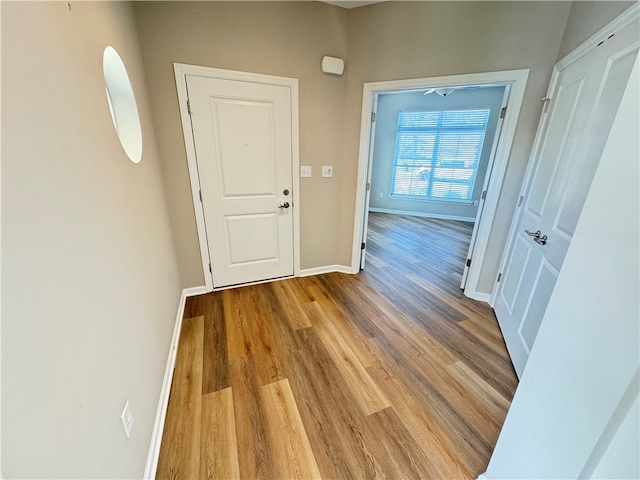 hallway featuring light wood-type flooring