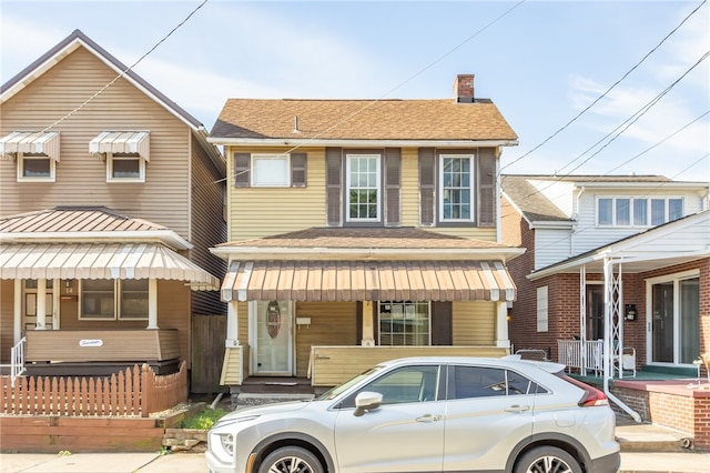 view of front of house with covered porch