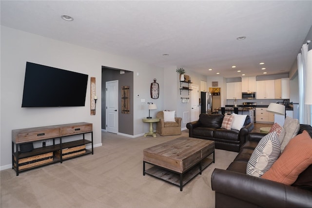 living room featuring light colored carpet