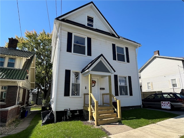 view of front of house with a front yard