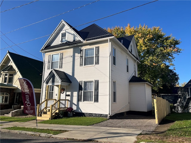 view of front property with a front lawn