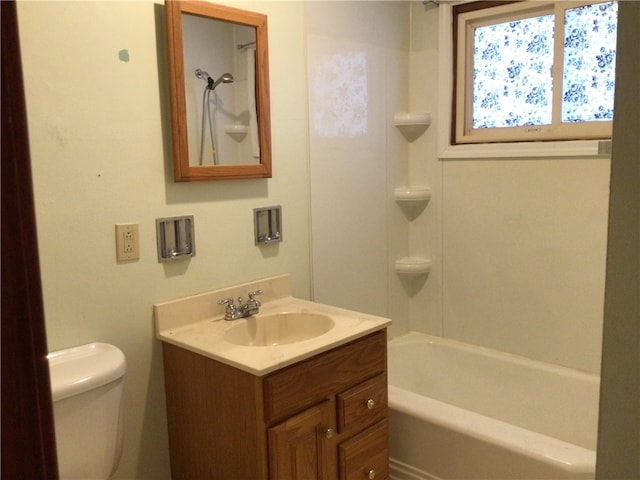 full bathroom featuring toilet, shower / bathtub combination, and vanity