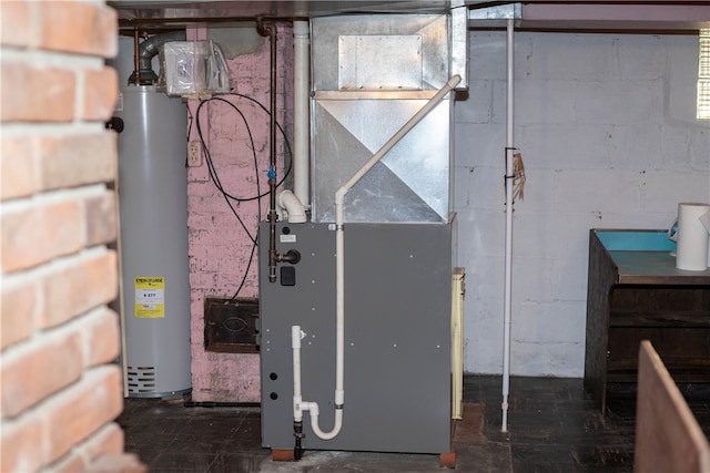 utility room featuring gas water heater