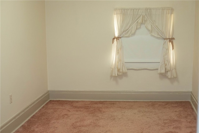 unfurnished room featuring carpet floors