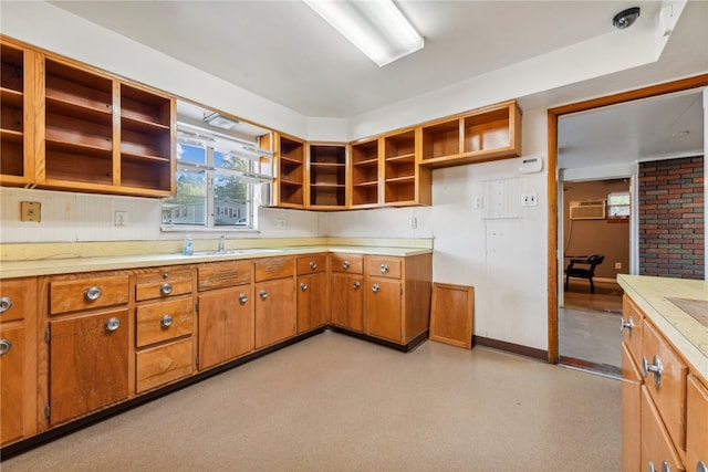 kitchen with sink and a wall mounted AC