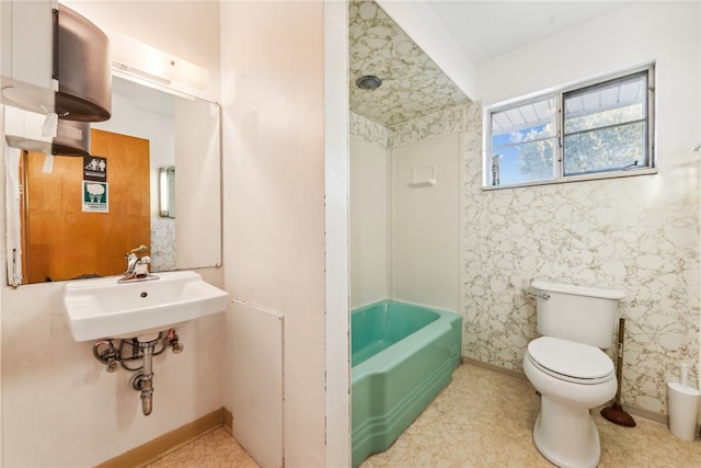 full bathroom with shower / bathtub combination, sink, and toilet