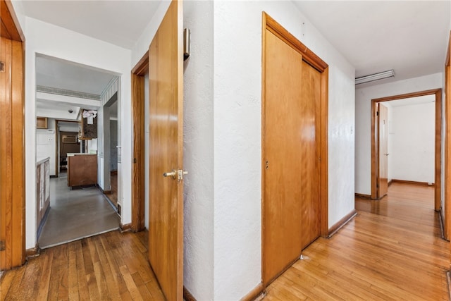 hall featuring light hardwood / wood-style flooring